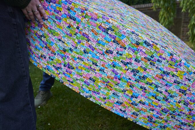 The boat hull covered in a colourful mosaic of overlapping My Nametags name labels