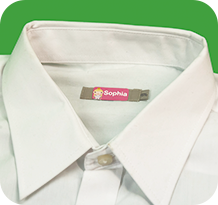 An iron-on name label bonded permanently into a garment