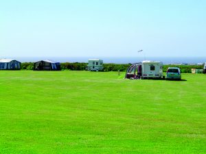 Image of campsite by the sea